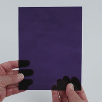 Video of the Deep Grape glass plate in transparent purple, 15x19cm, held up and tilted to show its pattern and transparency