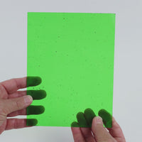 Video of the Neon Lime glass plate in transparent green, 15x19cm, held up and tilted to show its pattern and transparency